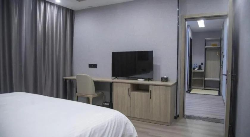 Bed in GreenTree Inn Anqing Tongcheng South Shengtang Road Shengtang International Business Hotel