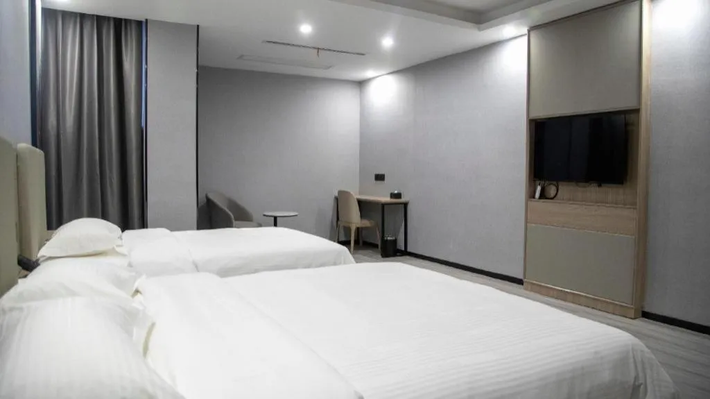 Bed in GreenTree Inn Anqing Tongcheng South Shengtang Road Shengtang International Business Hotel