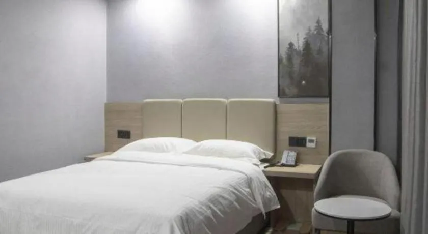 Bed in GreenTree Inn Anqing Tongcheng South Shengtang Road Shengtang International Business Hotel