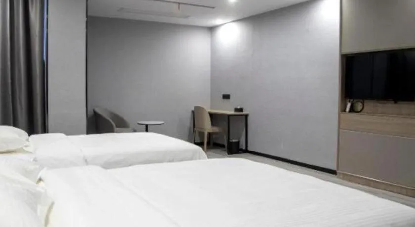 Bed in GreenTree Inn Anqing Tongcheng South Shengtang Road Shengtang International Business Hotel