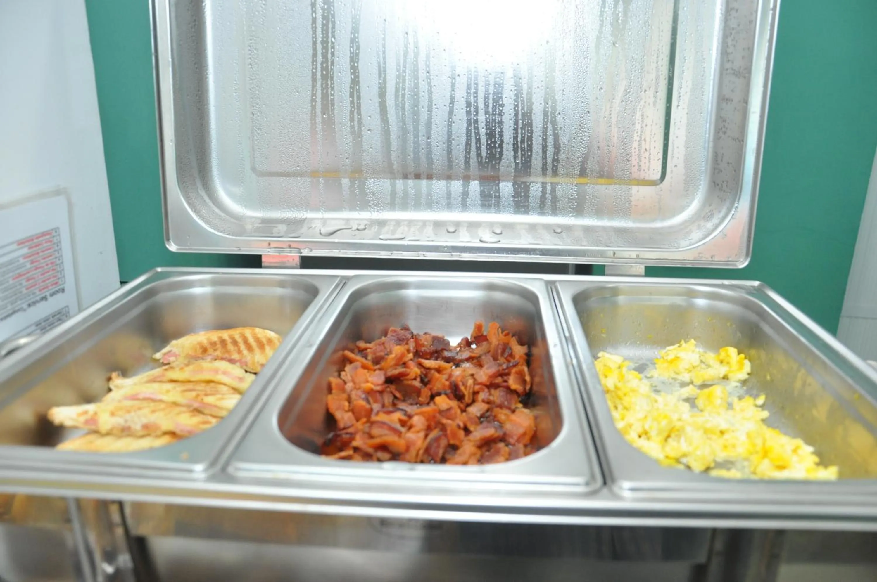 Buffet breakfast in Bonjour Hotel