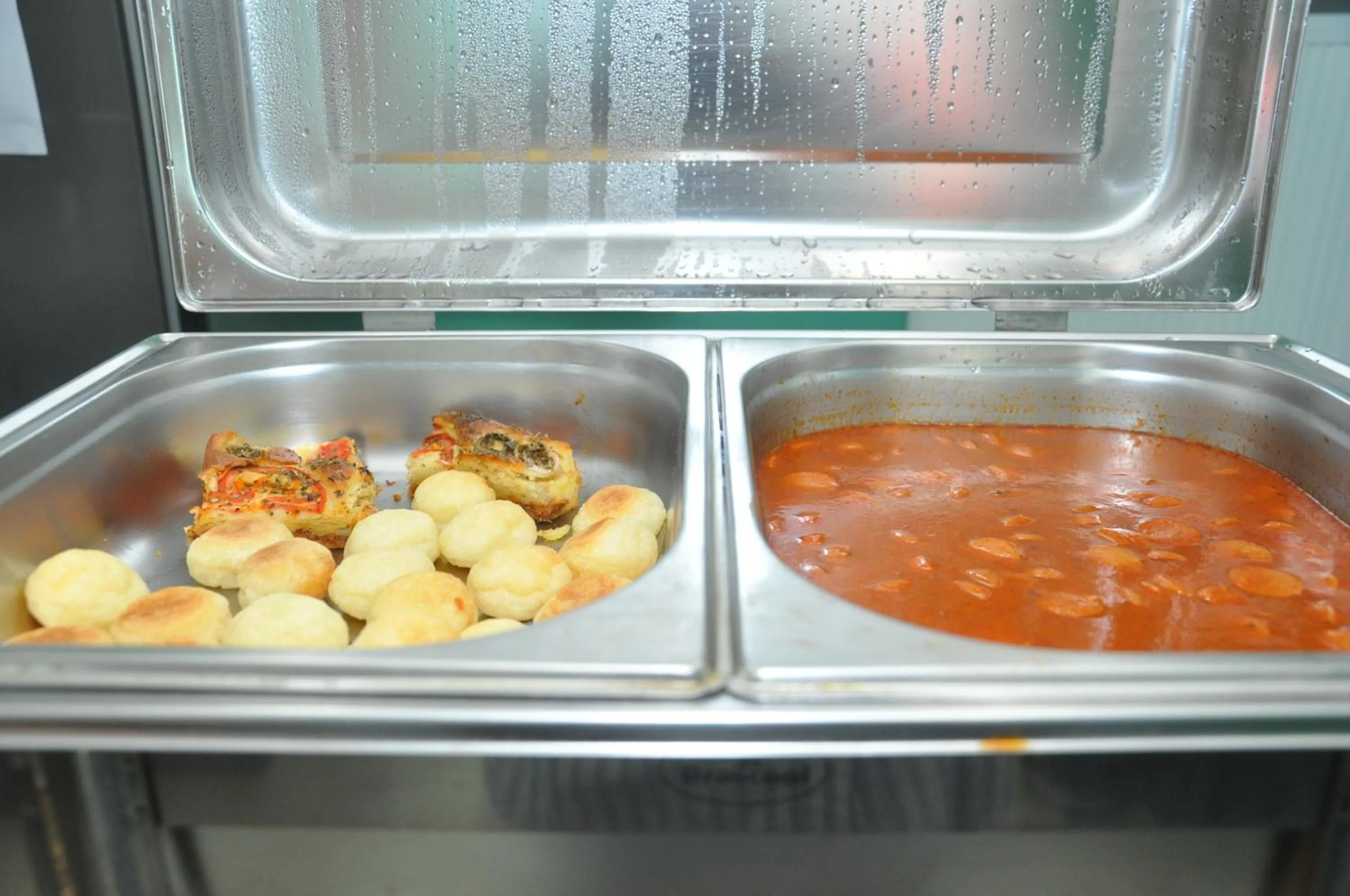 Buffet breakfast in Bonjour Hotel