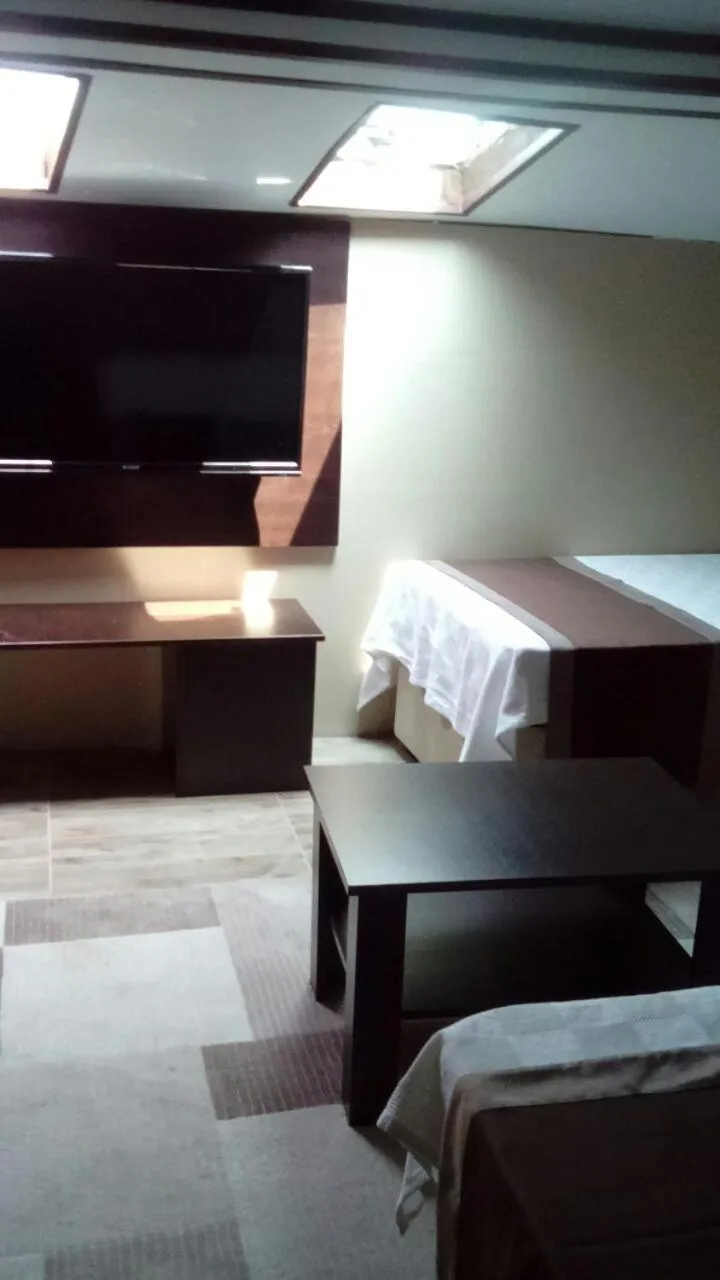 Bed in Lena Central Flats