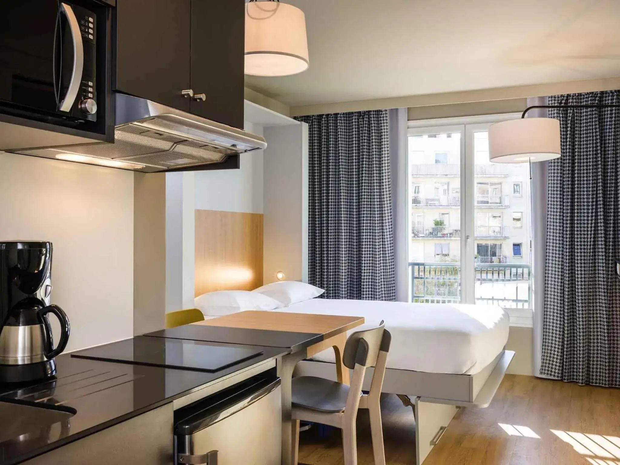 Bedroom in Aparthotel Adagio Access La Défense Puteaux Bedroom in Aparthotel Adagio Access La Défense Puteaux