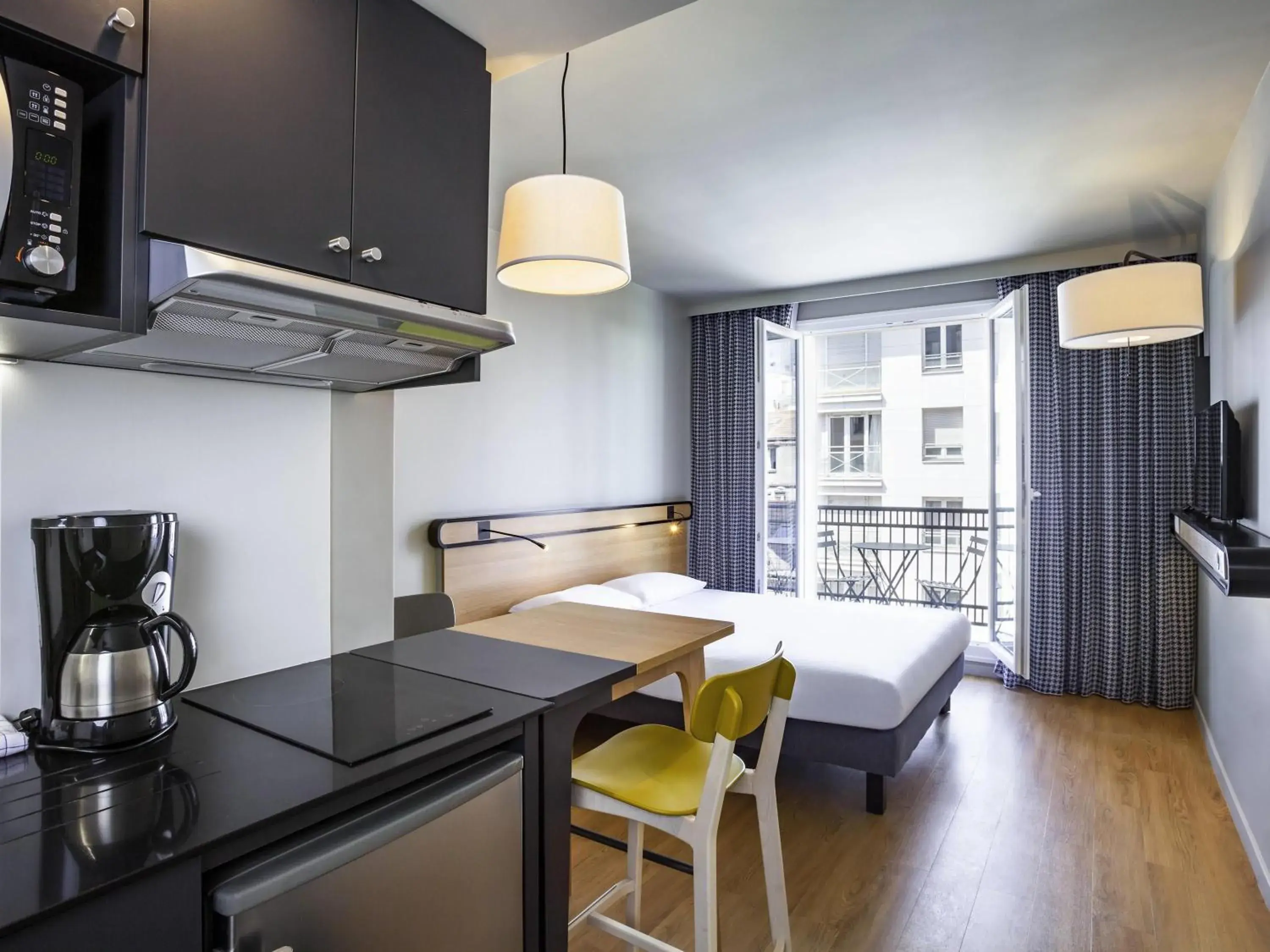 Bedroom in Aparthotel Adagio Access La Défense Puteaux Bedroom in Aparthotel Adagio Access La Défense Puteaux