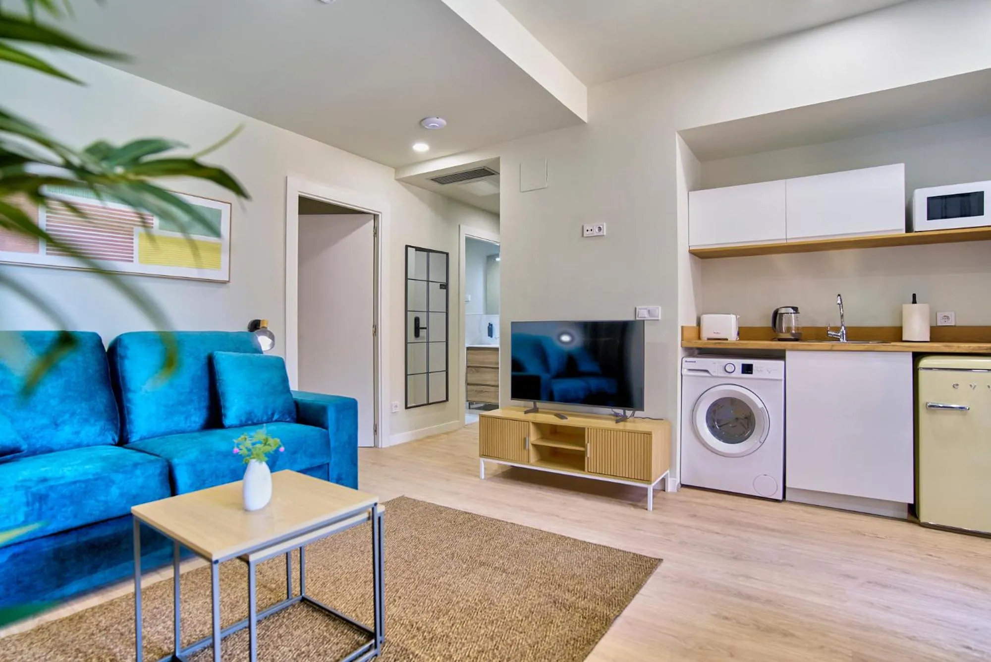 TV and multimedia in Apartamentos Olivia by gaiarooms