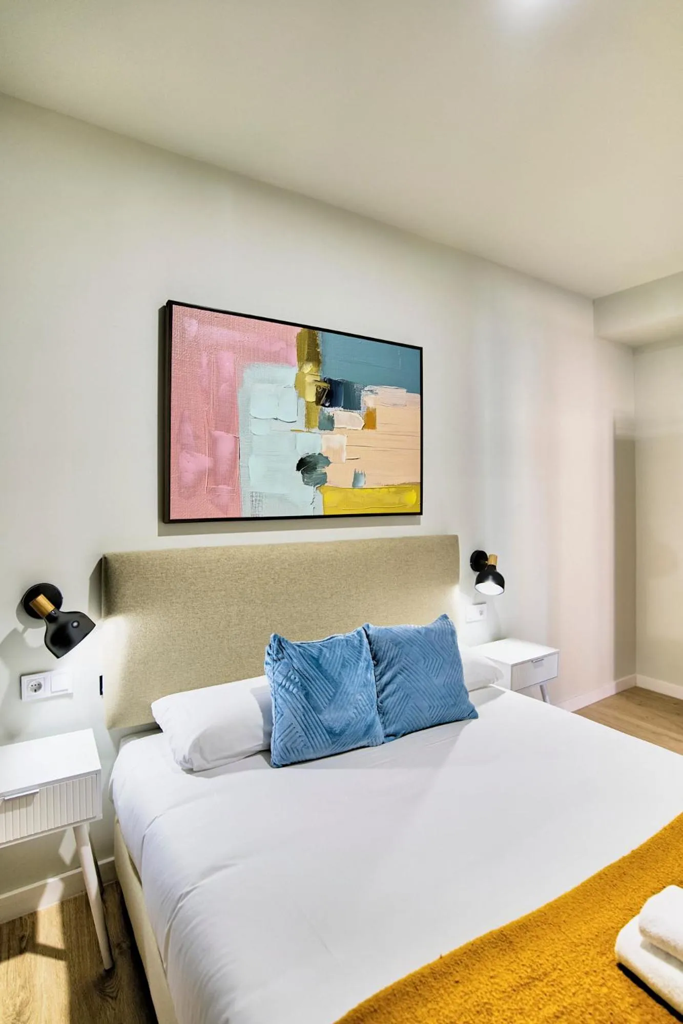 Bed in Apartamentos Olivia by gaiarooms