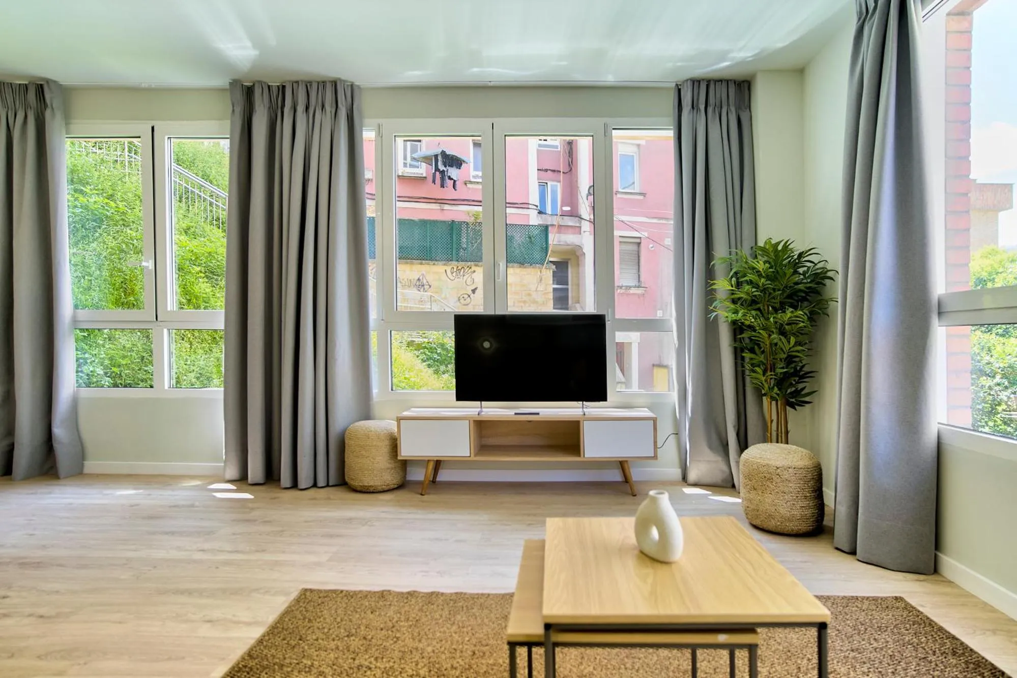 TV and multimedia in Apartamentos Olivia by gaiarooms