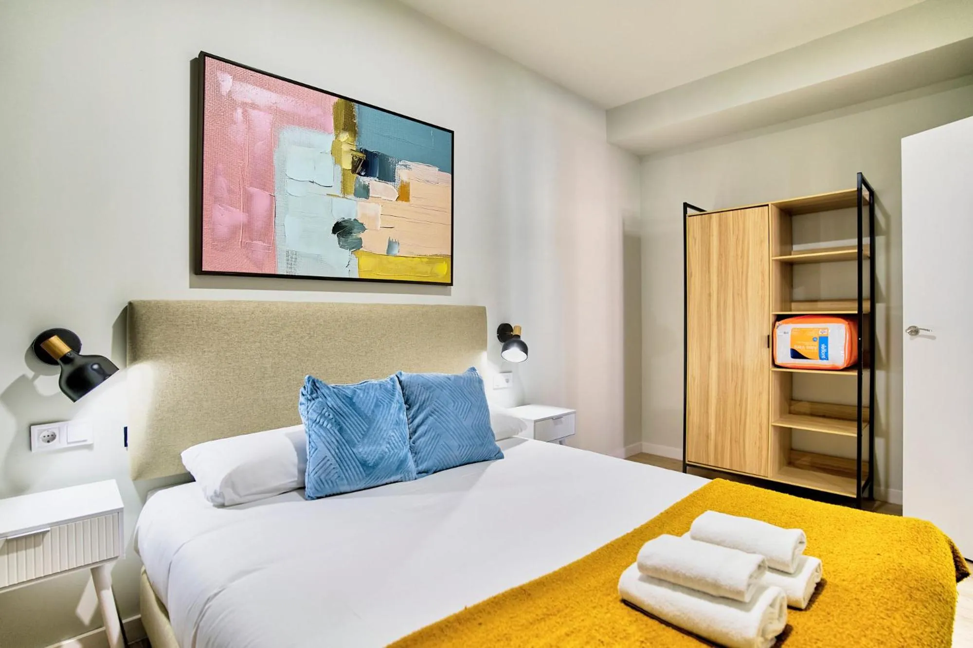 Bed in Apartamentos Olivia by gaiarooms