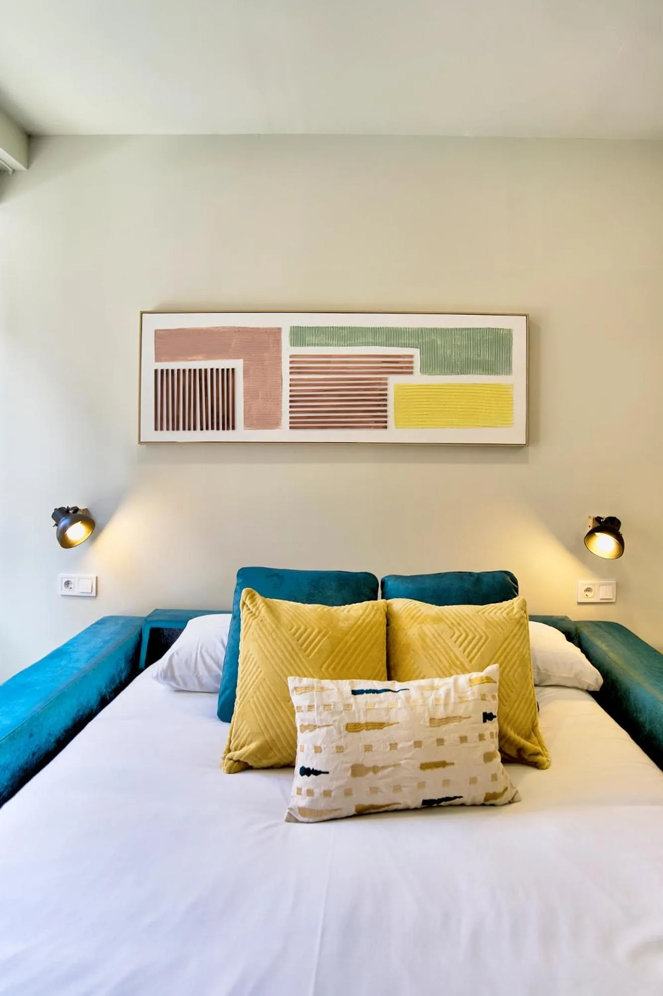 Bed in Apartamentos Olivia by gaiarooms