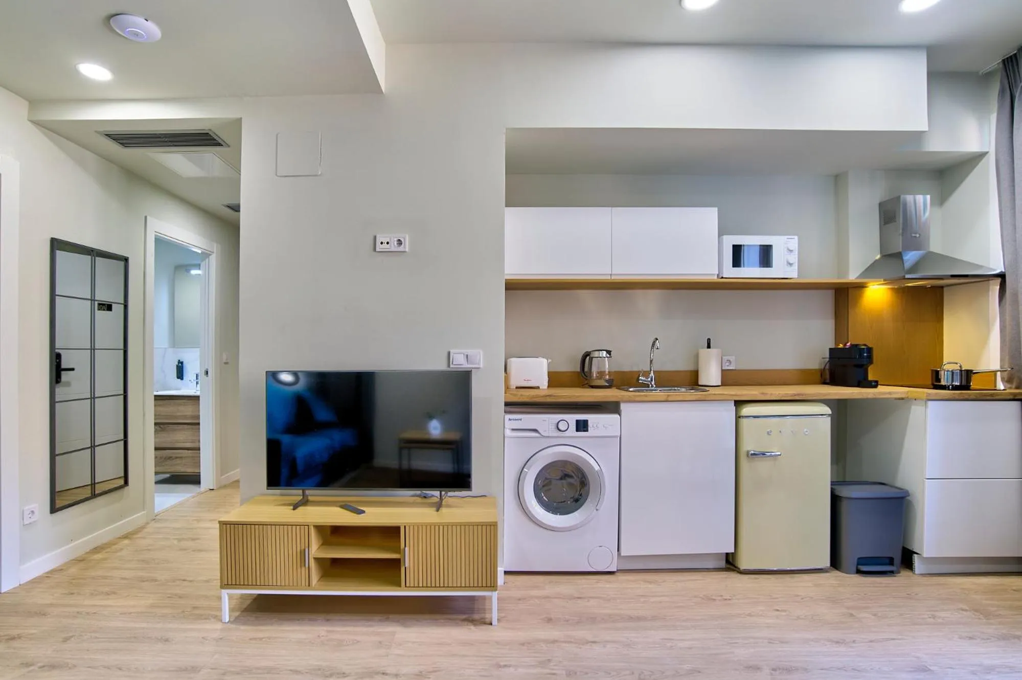 TV and multimedia in Apartamentos Olivia by gaiarooms