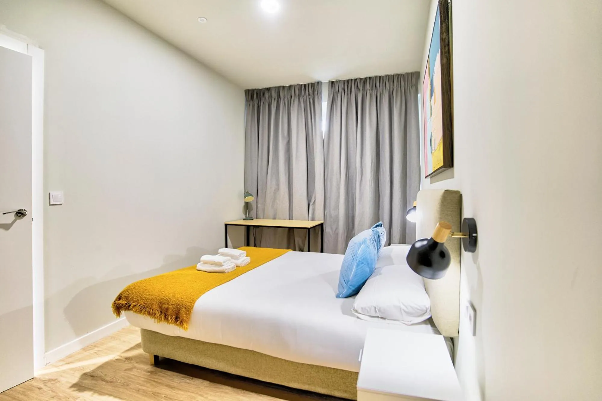 Bed in Apartamentos Olivia by gaiarooms