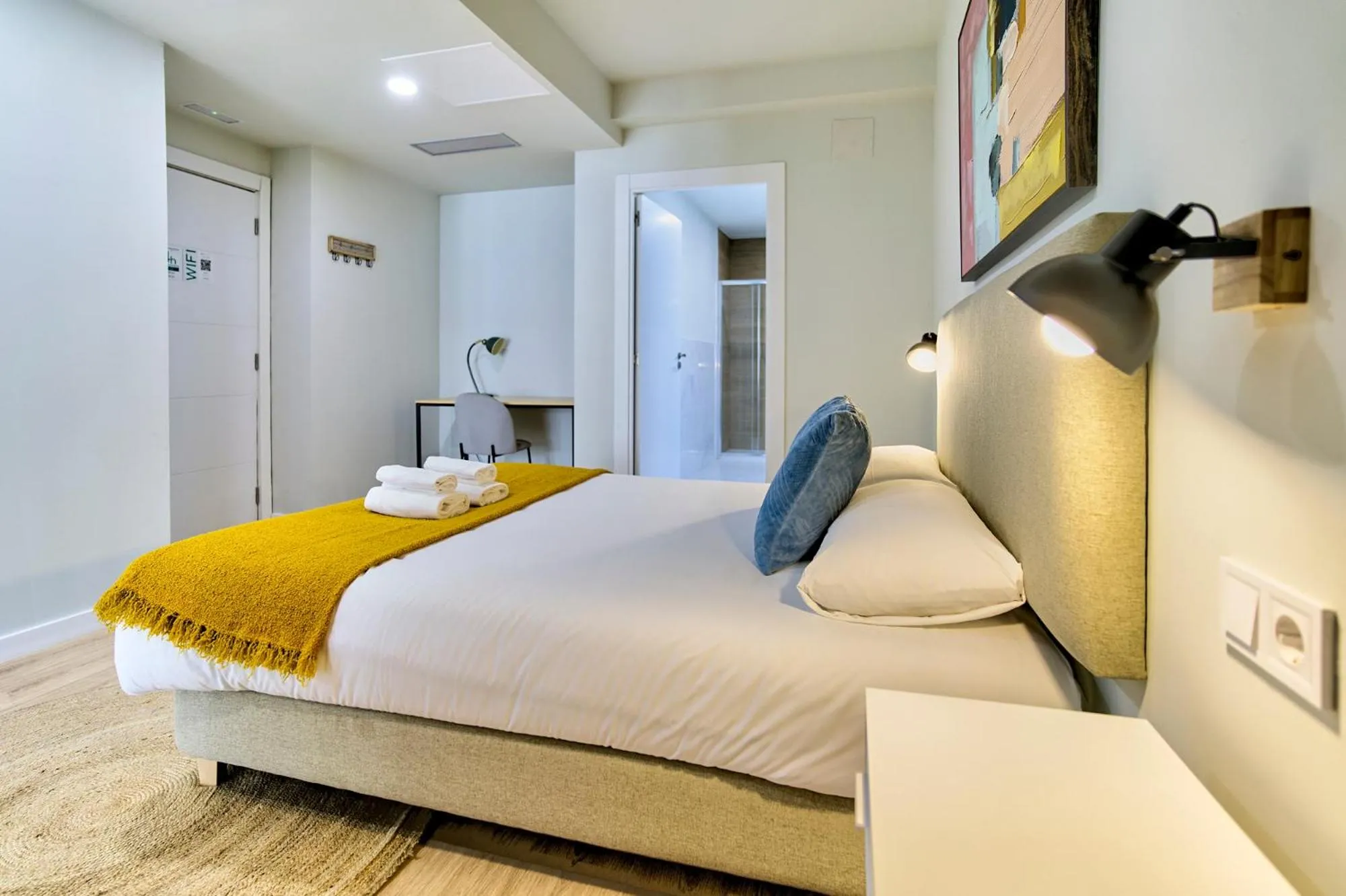 Bed in Apartamentos Olivia by gaiarooms