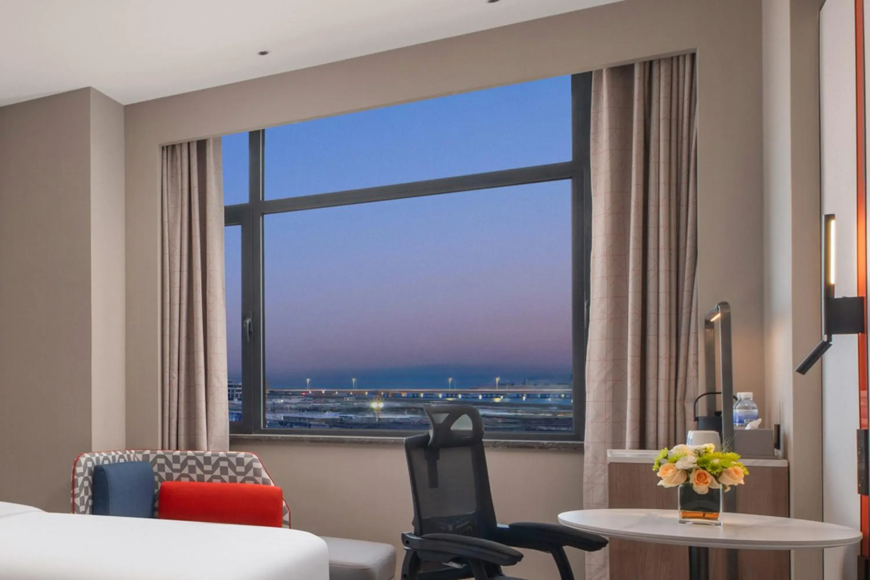 View (from property/room), Bed in Holiday Inn Express Qingdao City Balcony by IHG View (from property/room), Bed in Holiday Inn Express Qingdao City Balcony by IHG