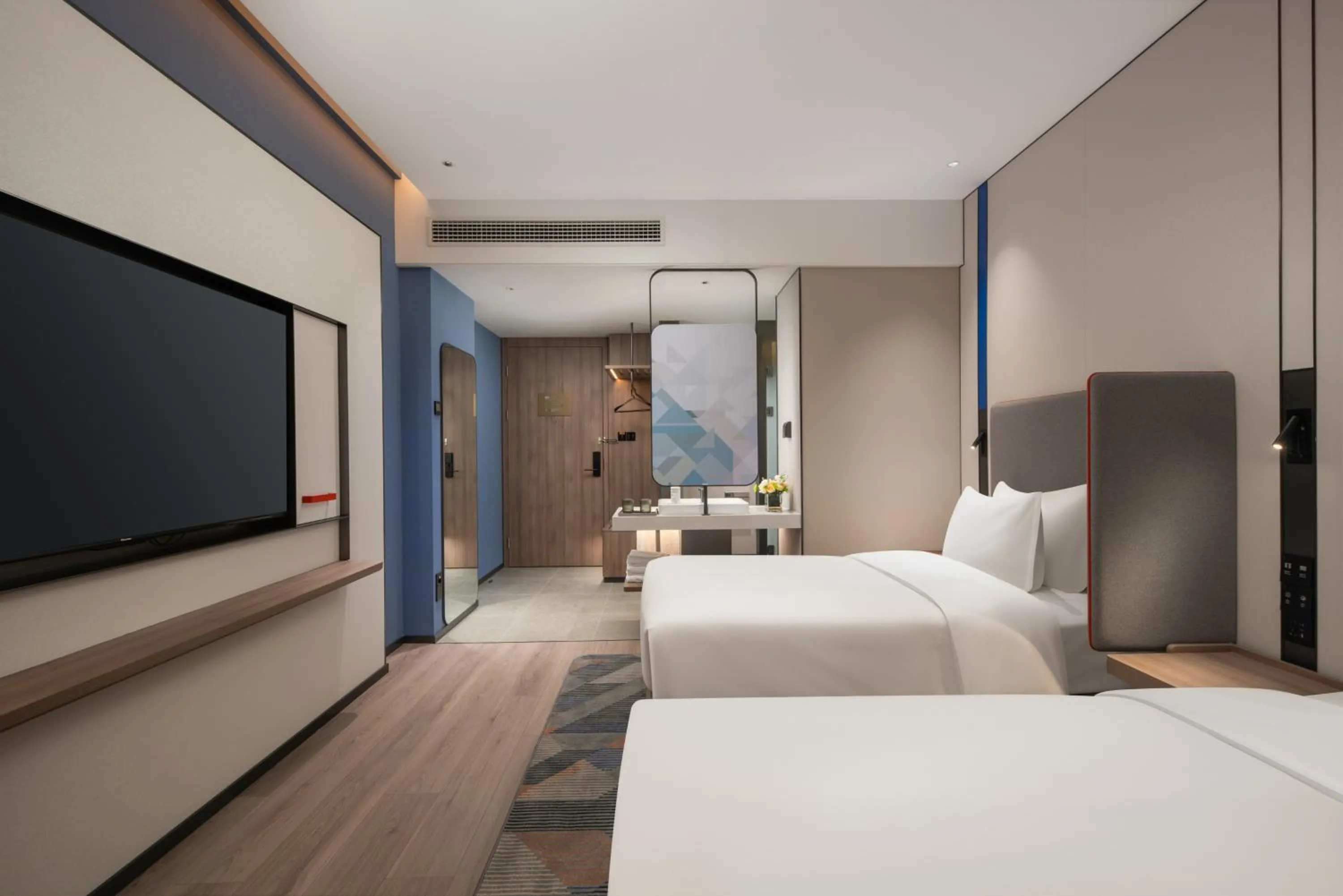 Bed in Holiday Inn Express Qingdao City Balcony by IHG