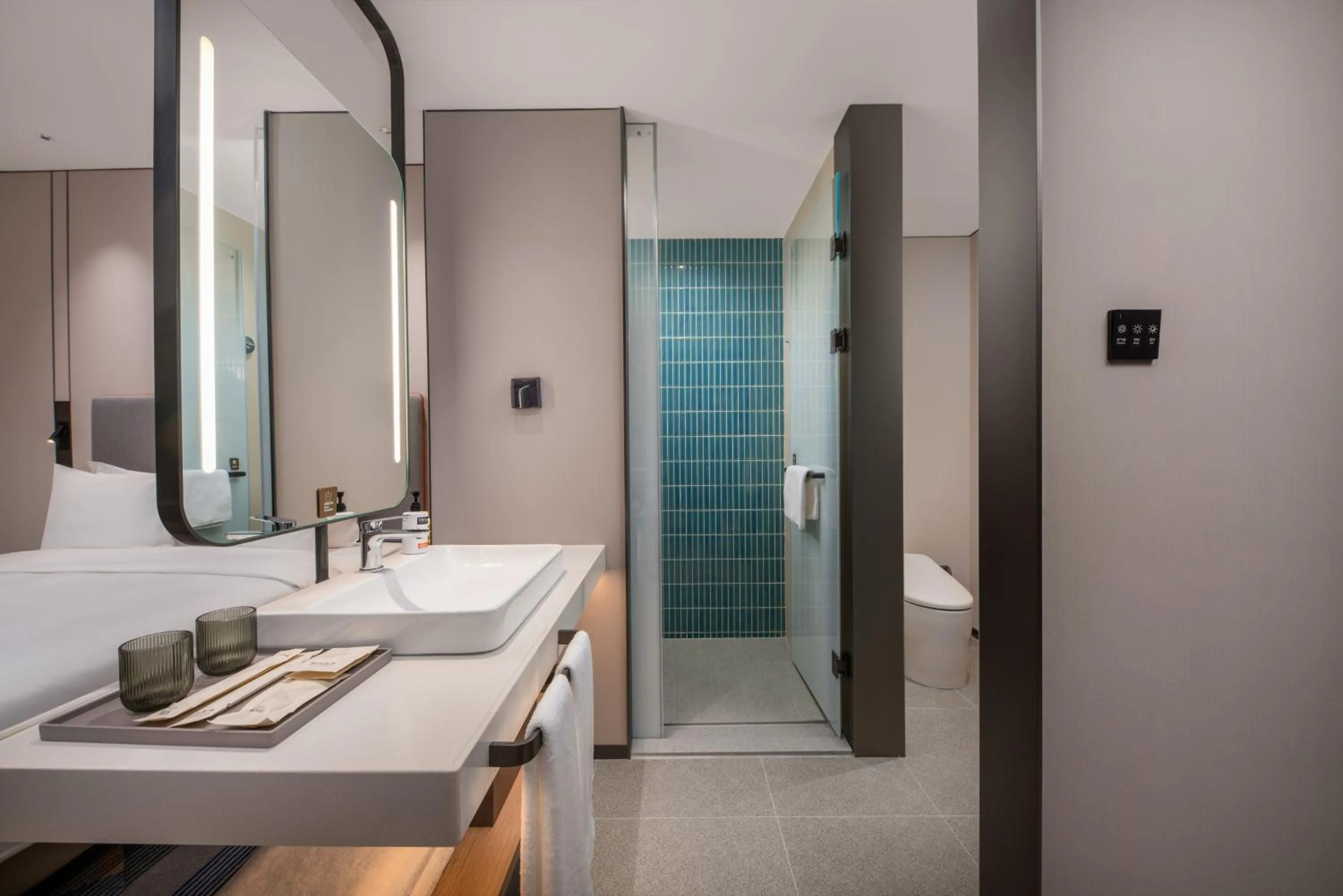 Shower in Holiday Inn Express Qingdao City Balcony by IHG