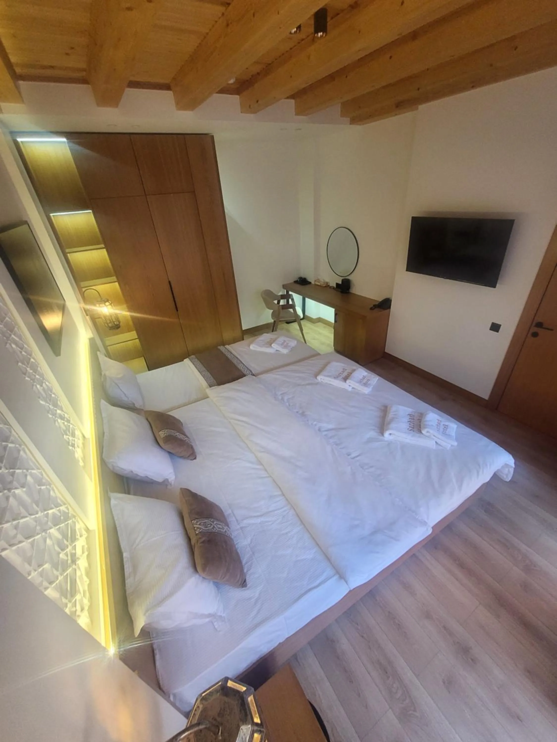 Photo of the whole room, Bed in Sarhad Hotel