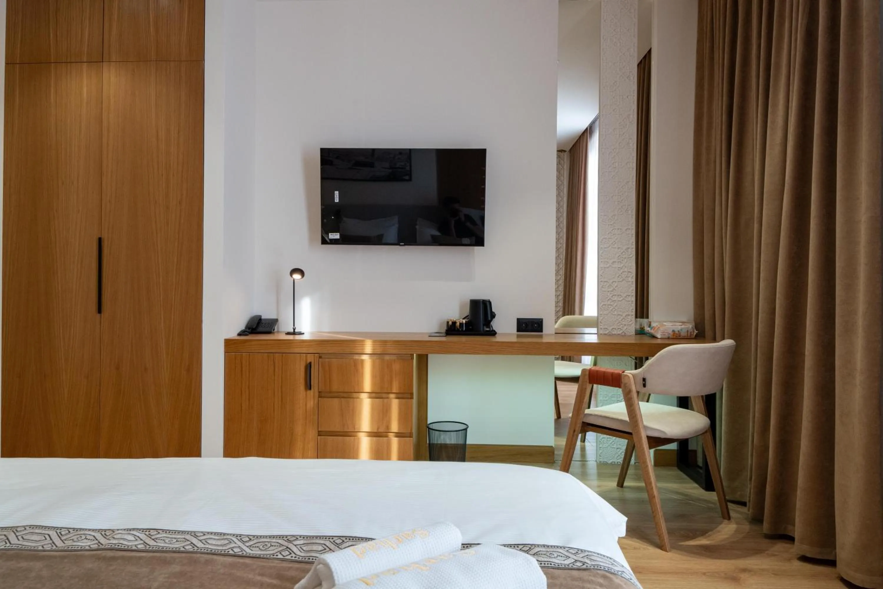 Photo of the whole room, Bed in Sarhad Hotel