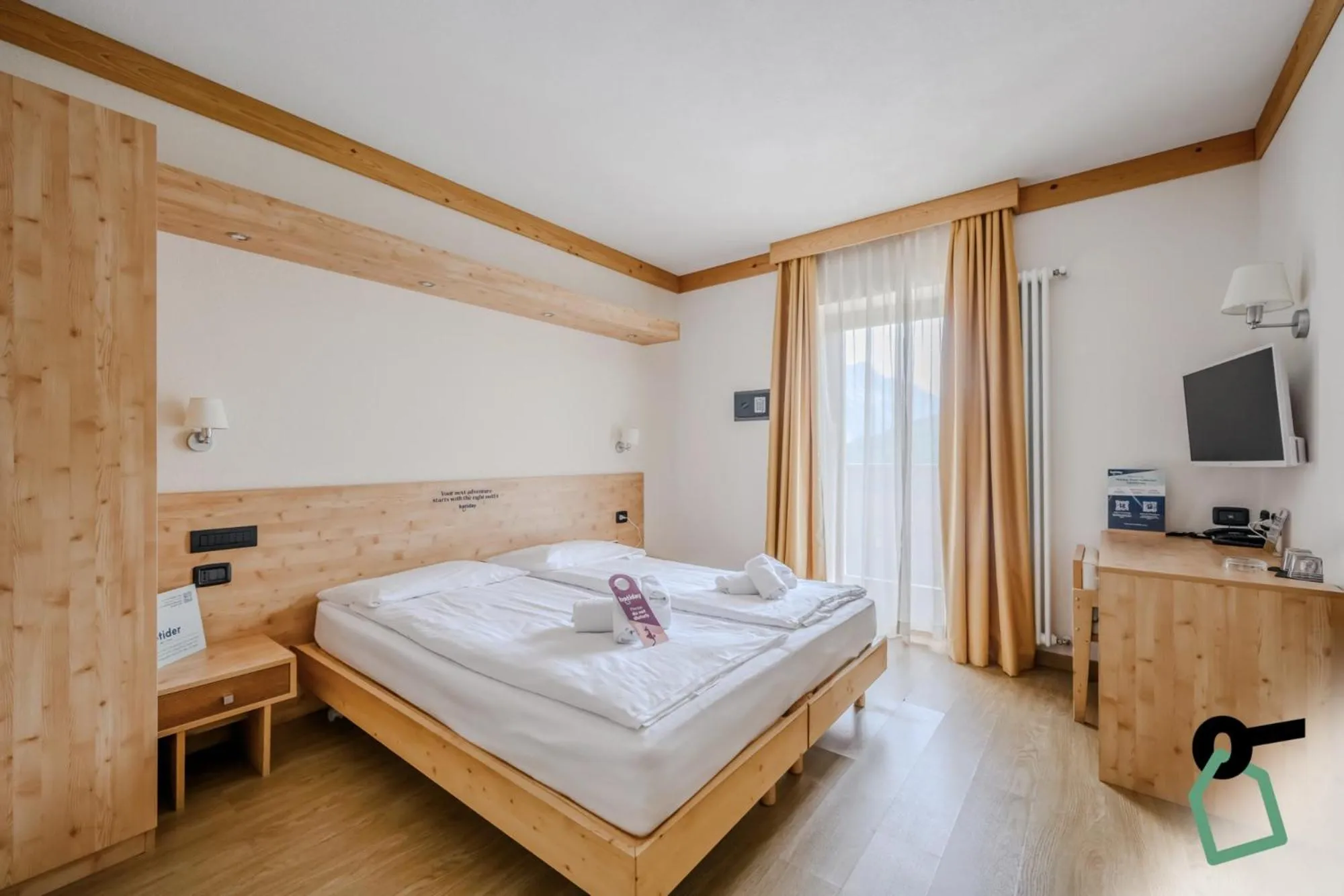 Photo of the whole room, Bed in Hotiday Bormio Valdidentro