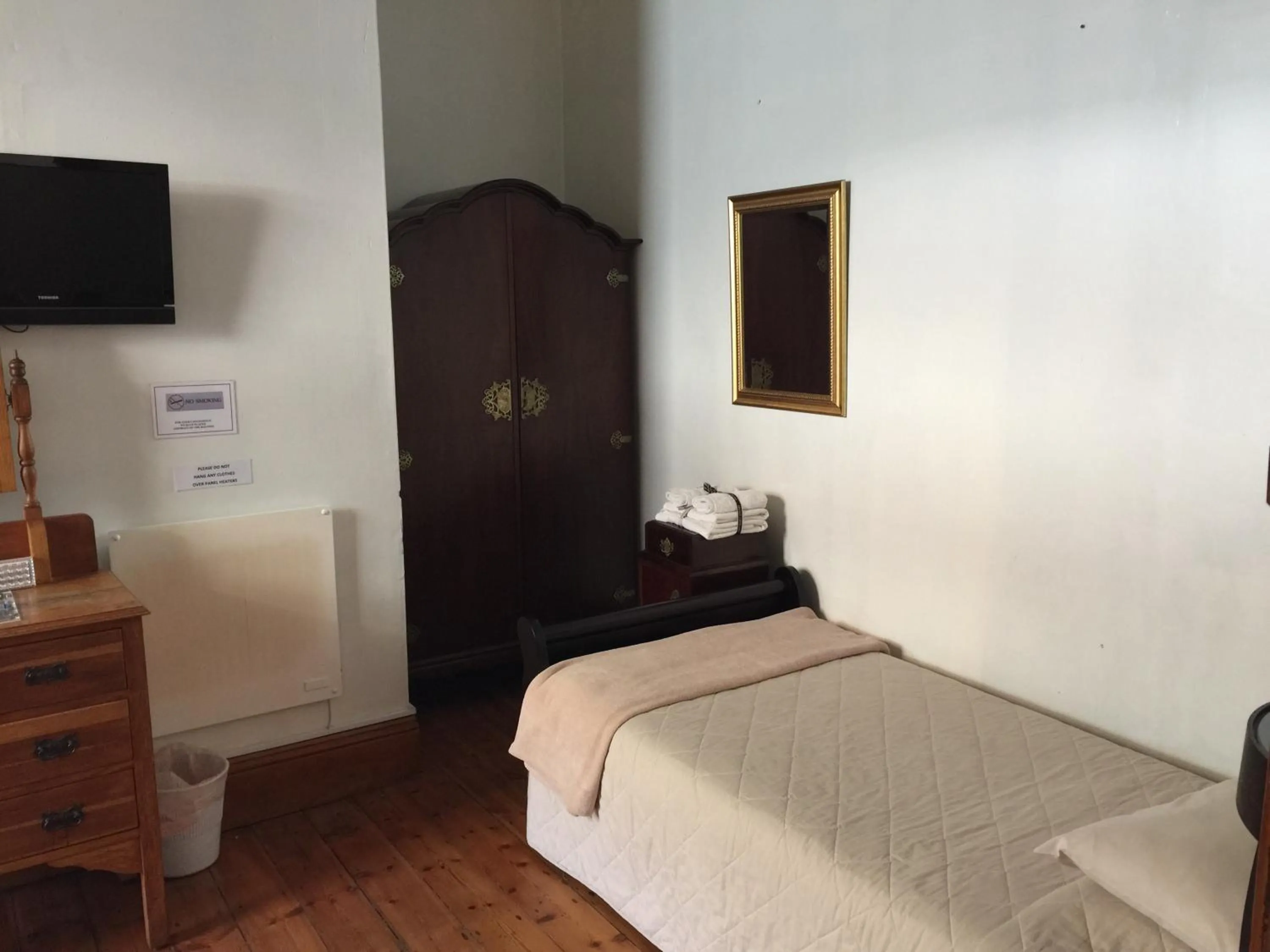 Photo of the whole room, Bed in Central Hotel Guest House