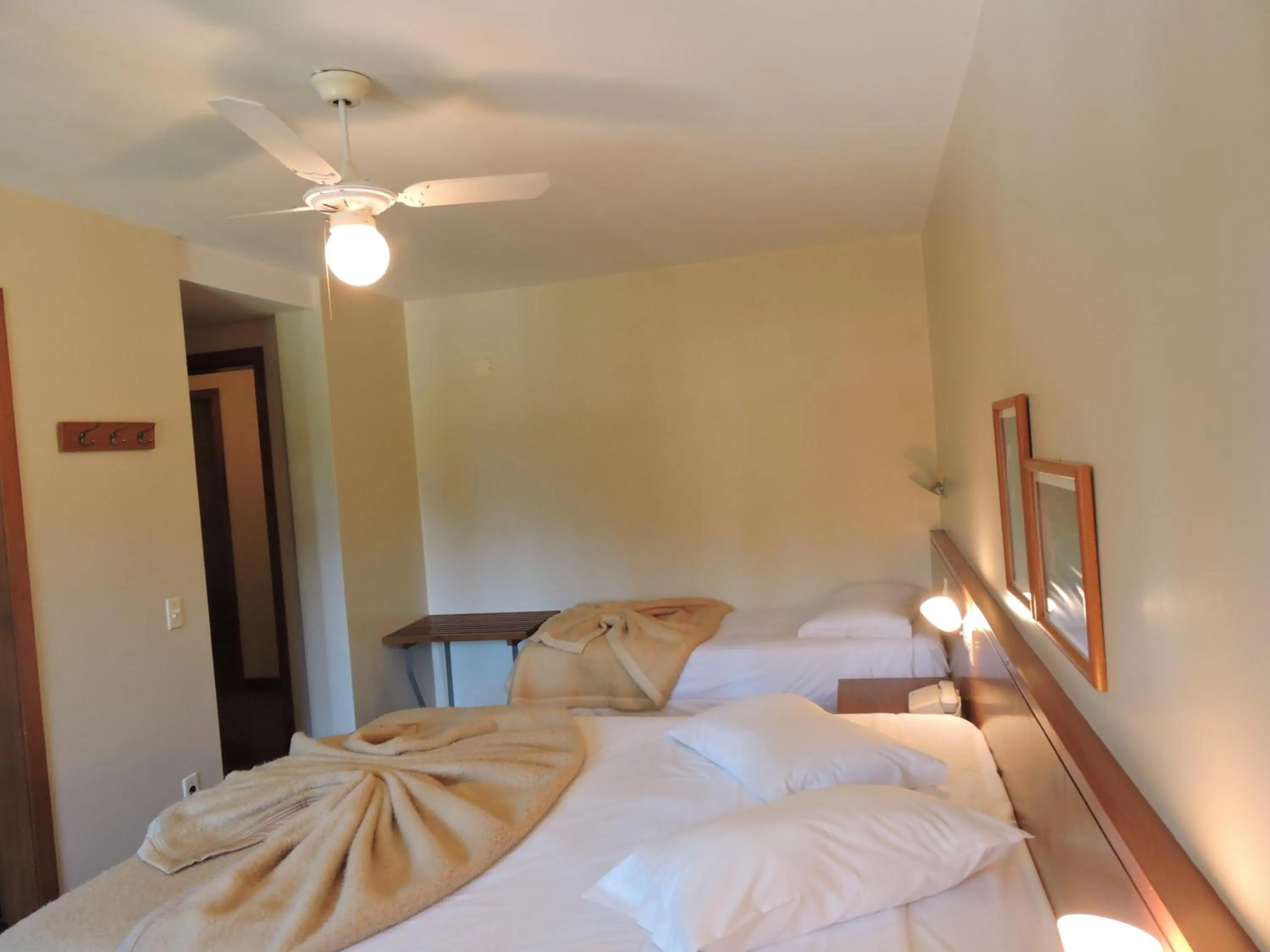 Photo of the whole room, Bed in Estalagem Vila Suzana - Quadra de Beach Tennis Indoor