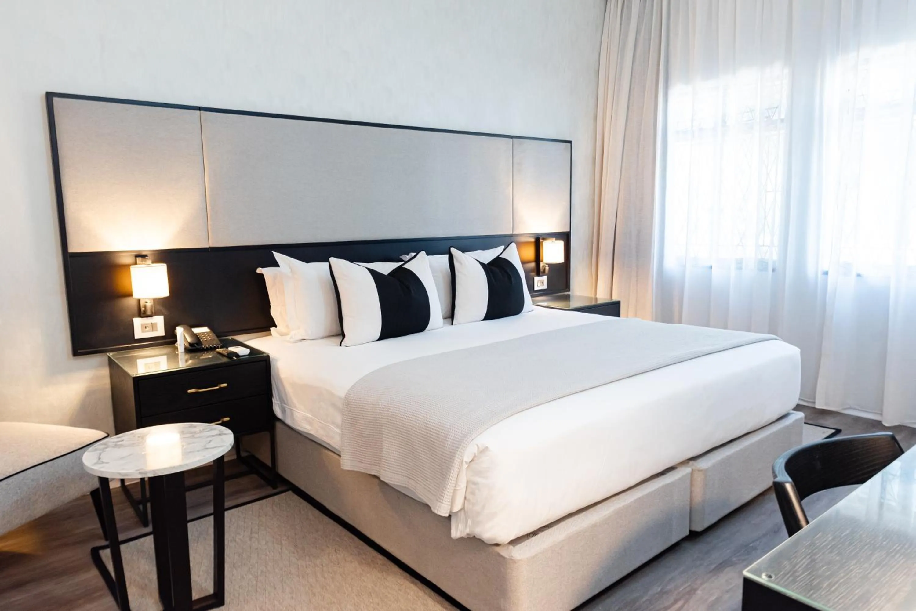 Bed in Cresta Churchill Hotel