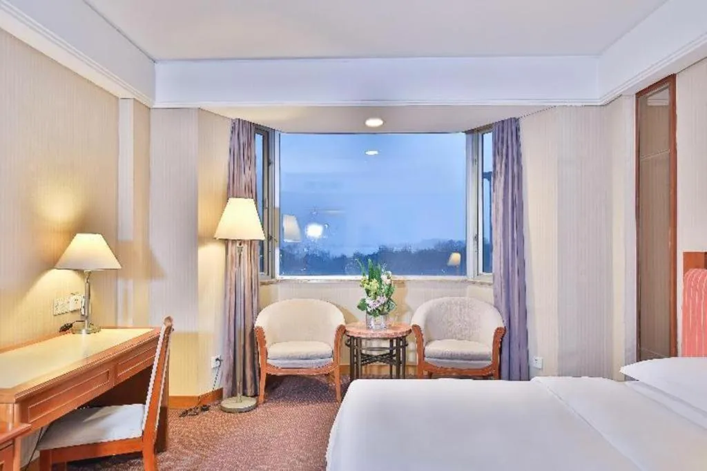 Bed in Haihua Hotel Hangzhou