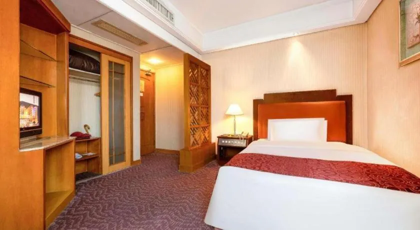 Bed in Haihua Hotel Hangzhou