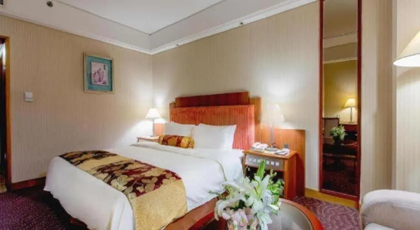 Bed in Haihua Hotel Hangzhou