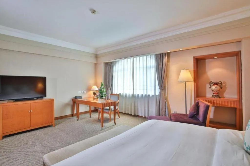 Bed in Haihua Hotel Hangzhou