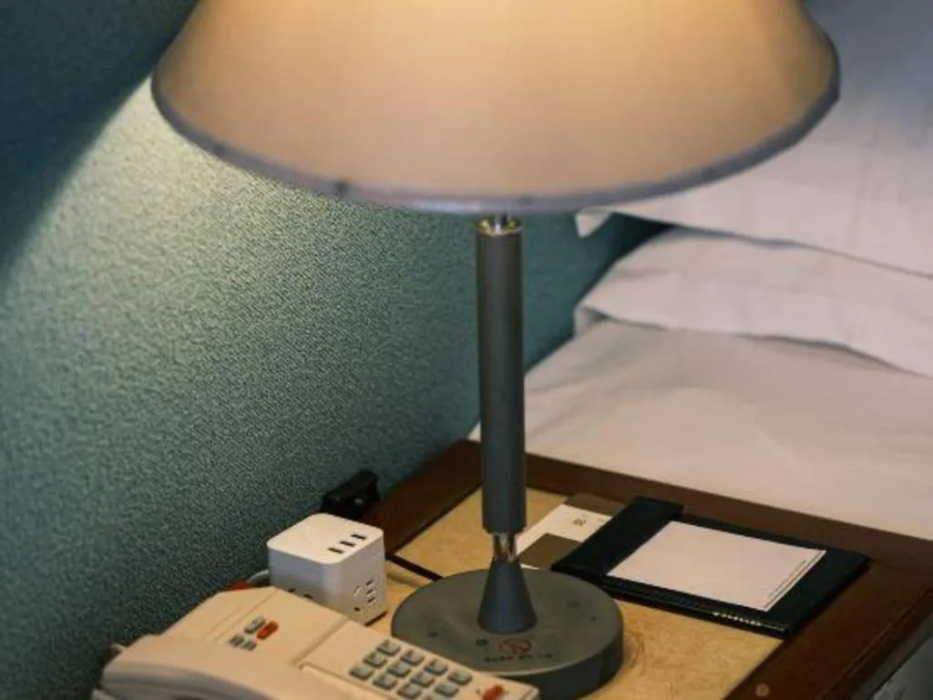 Bed in Haihua Hotel Hangzhou