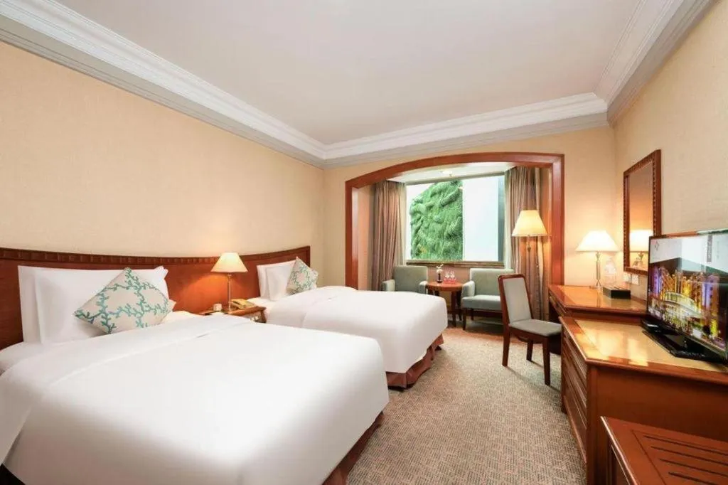 Bed in Haihua Hotel Hangzhou