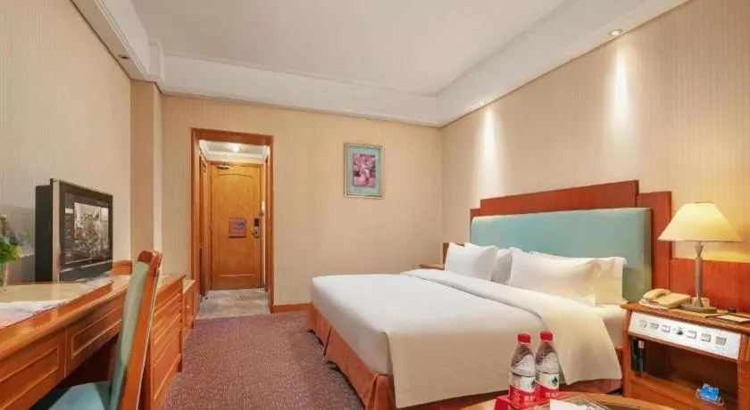 Bed in Haihua Hotel Hangzhou