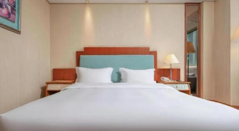 Bed in Haihua Hotel Hangzhou