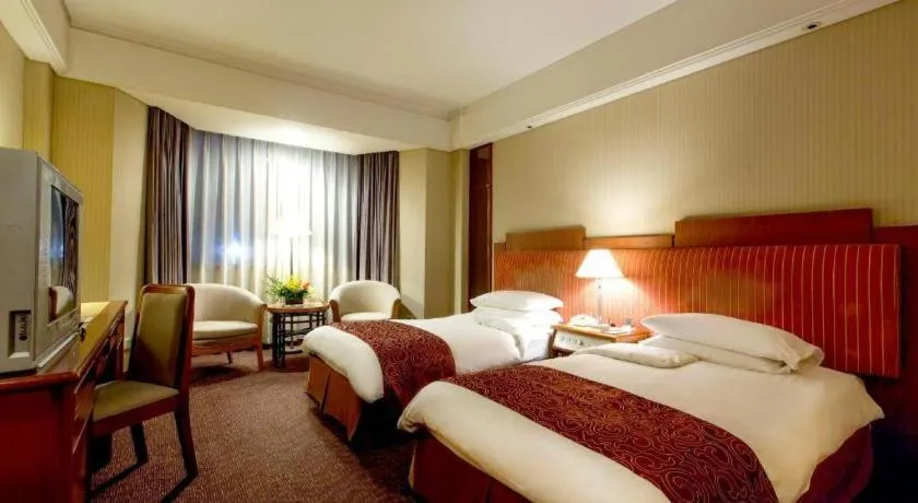 Bed in Haihua Hotel Hangzhou