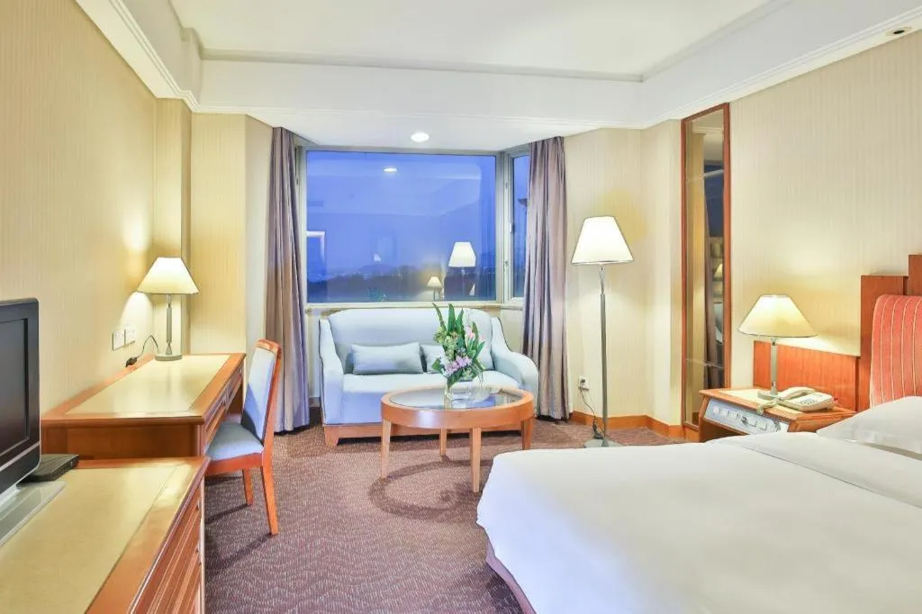 Bed in Haihua Hotel Hangzhou