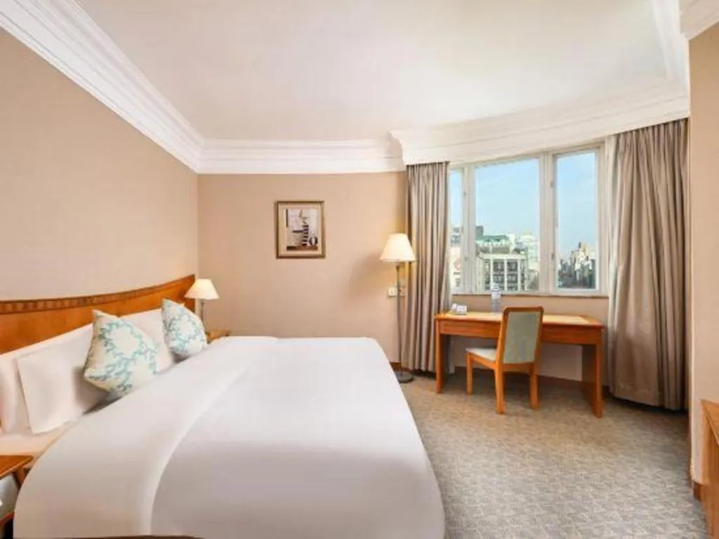 Bed in Haihua Hotel Hangzhou