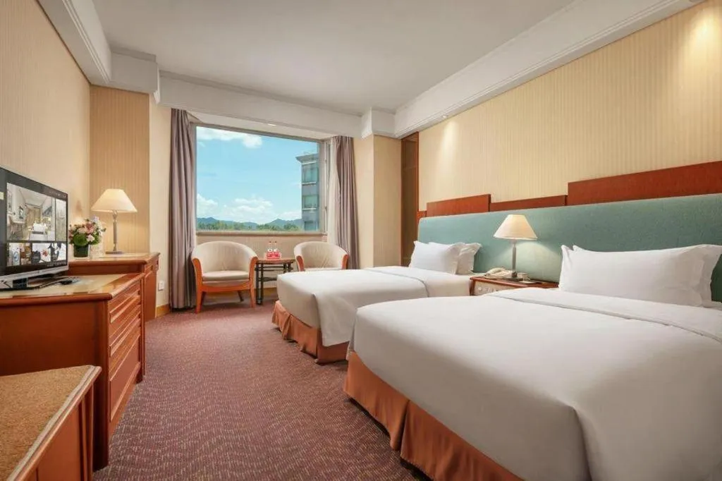 Bed in Haihua Hotel Hangzhou