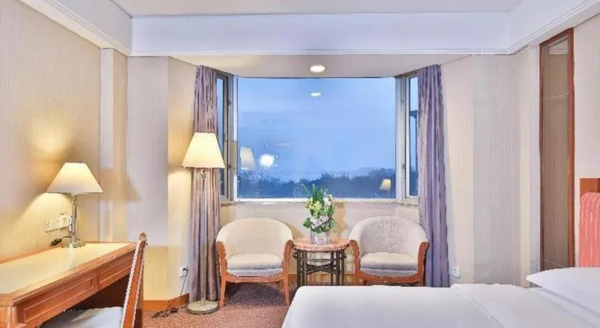 Bed in Haihua Hotel Hangzhou