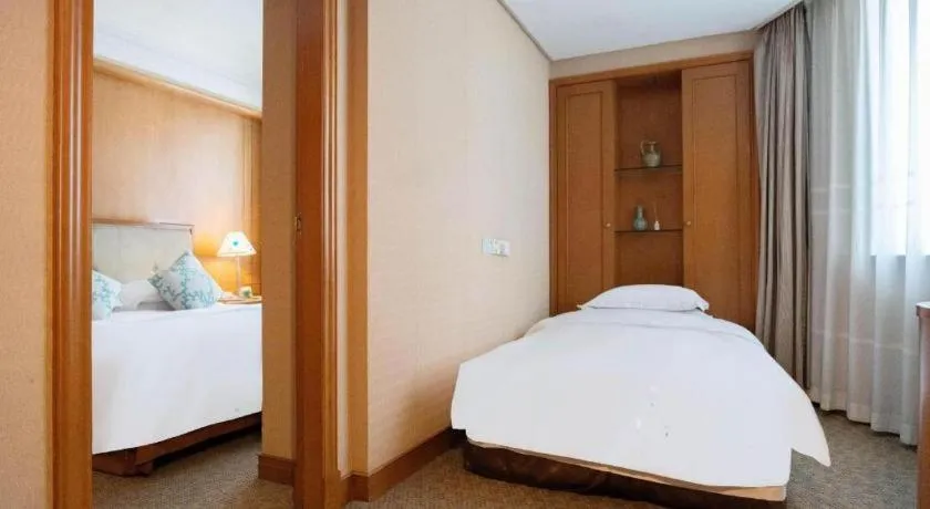 Bed in Haihua Hotel Hangzhou