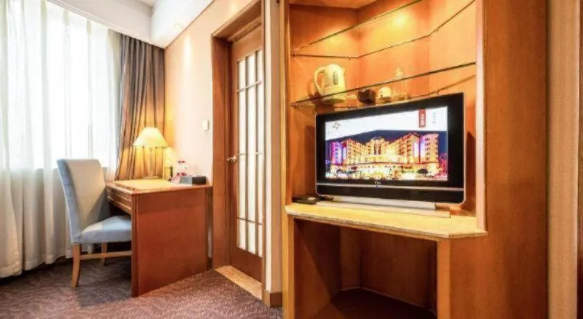 Bed in Haihua Hotel Hangzhou