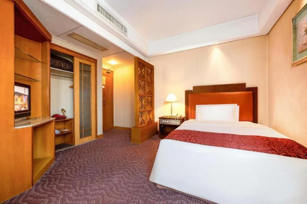 Bed in Haihua Hotel Hangzhou