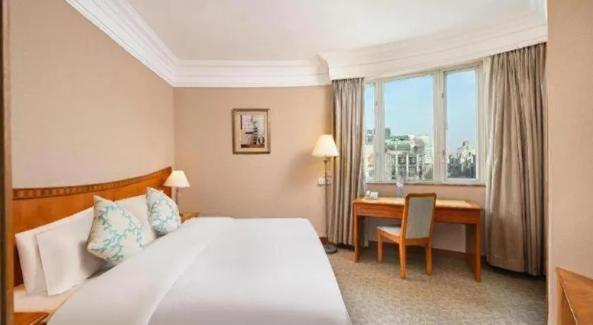 Bed in Haihua Hotel Hangzhou