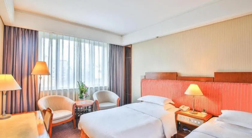 Bed in Haihua Hotel Hangzhou