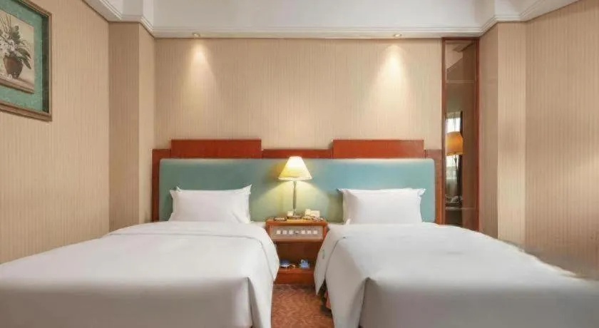 Bed in Haihua Hotel Hangzhou