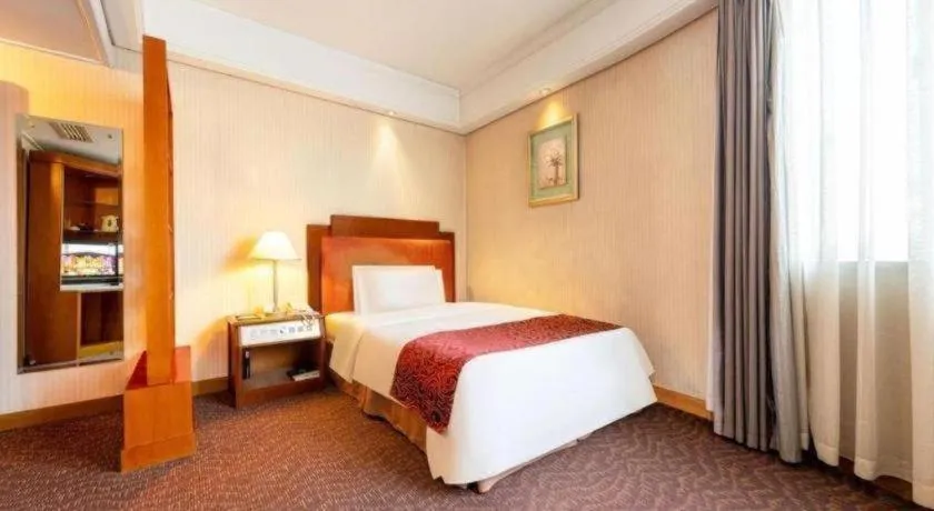 Bed in Haihua Hotel Hangzhou