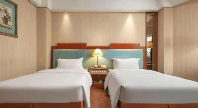 Bed in Haihua Hotel Hangzhou