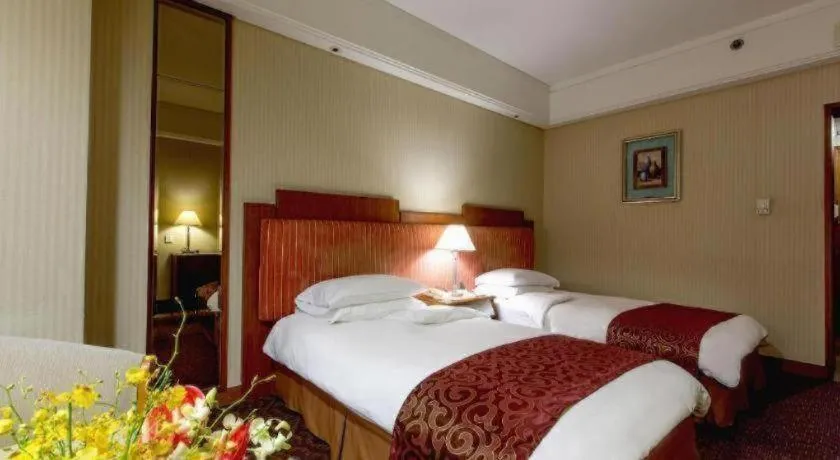 Bed in Haihua Hotel Hangzhou