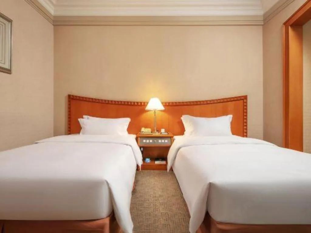 Bed in Haihua Hotel Hangzhou