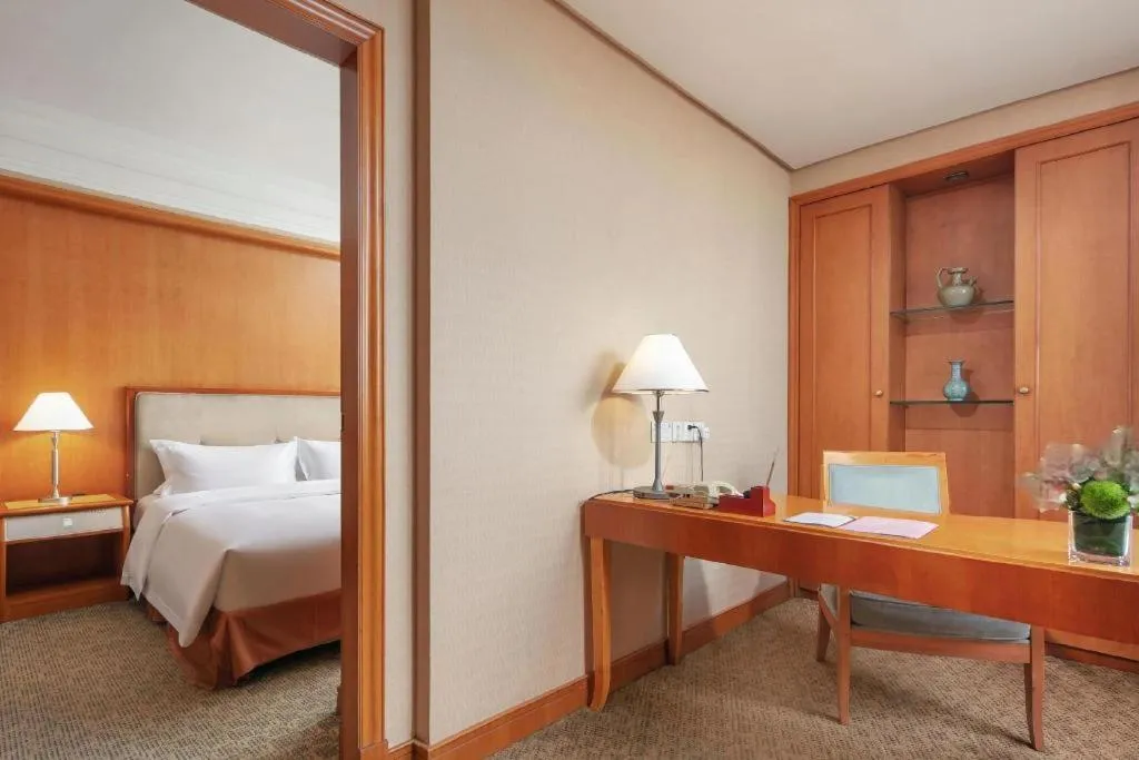 Bed in Haihua Hotel Hangzhou